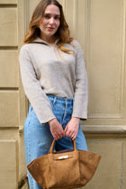 Pull court col zippé beige chiné
