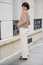 Trench courte beige avec col à cordons