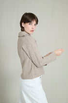 Pull court col zippé beige chiné