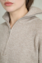 Pull court col zippé beige chiné