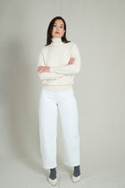 Pull col roulé maille fine sans couture crème